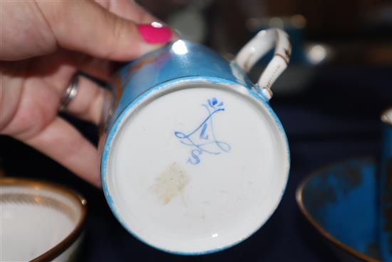 A Sevres style Madame de Genlis bleu celeste coffee can and saucer, a Sevres style coffee can and a Sevres Empire revival tea cup, al